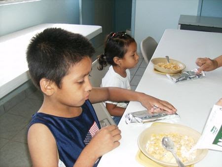 A child eating a meal at the nutrition program in Mexico A child eating a meal at the nutrition program in Mexico