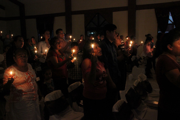 Singing Silent Night by candelight at a Christmas fiesta in Reynosa Singing Silent Night by candelight at a Christmas fiesta in Reynosa