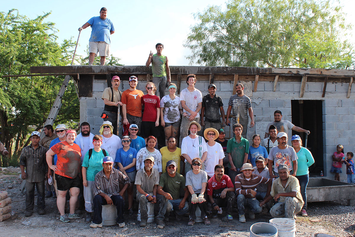 A team with the staff and volunteers in Reynosa after a roof pour