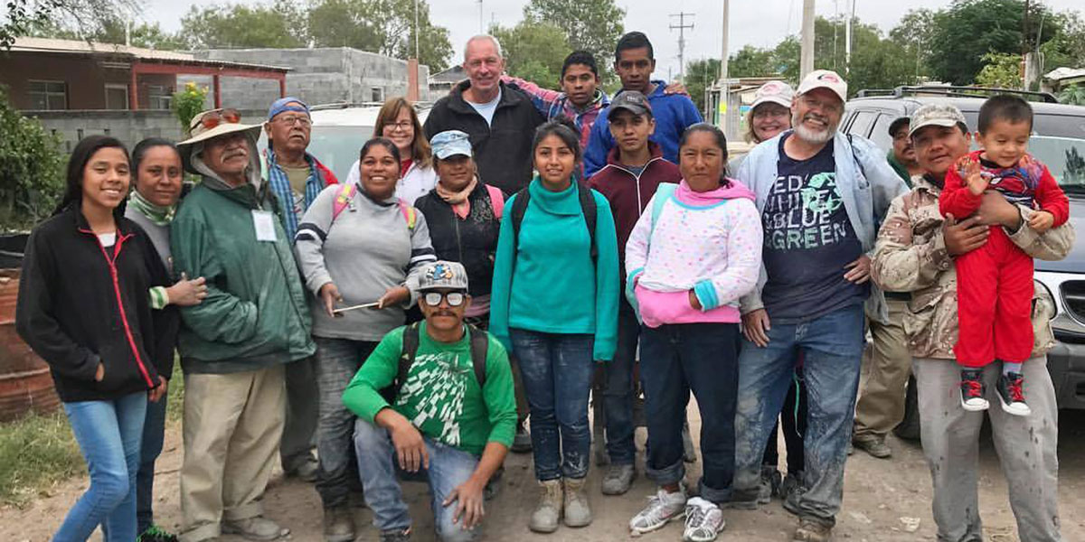 Friends from the US and Mexico working together in Mexico