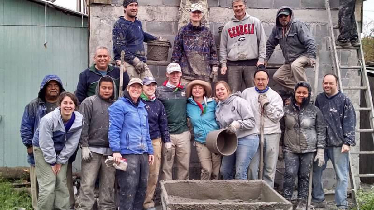 A mission work group after pouring a roof in Reynosa