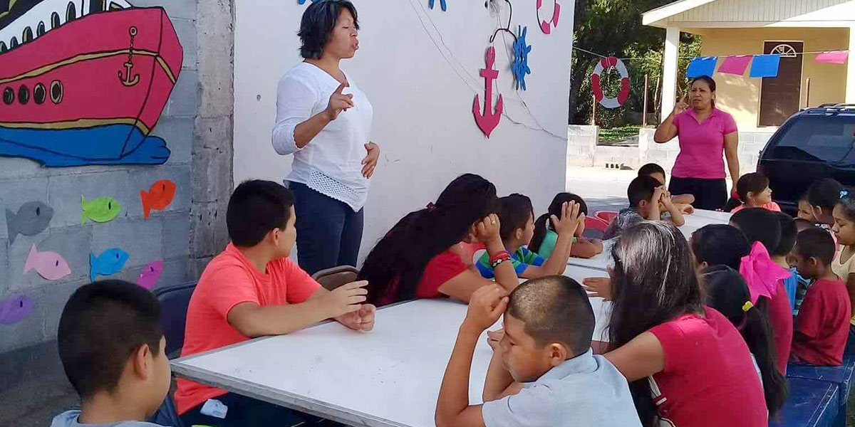 Kids learning a Bible lesson at Vacation Bible School in Guardados de Arriba