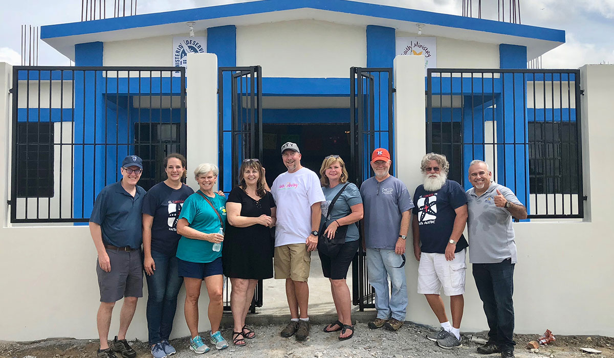 The Board of Directors in front of the new community center
