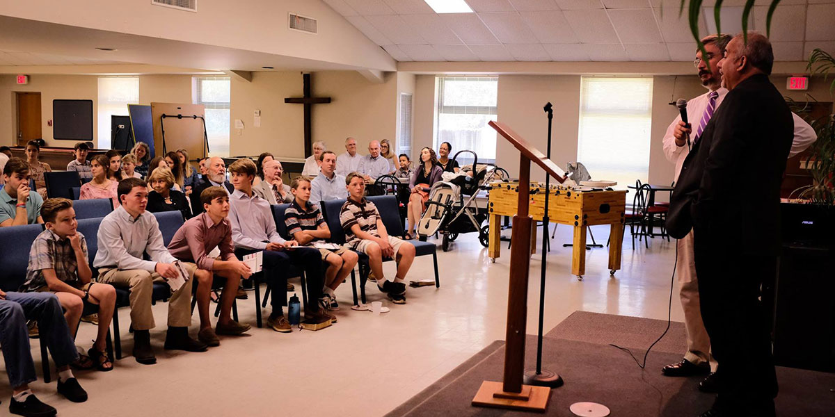 David sharing about the work Faith Ministry is doing with friends at New Covenant Presbyterian