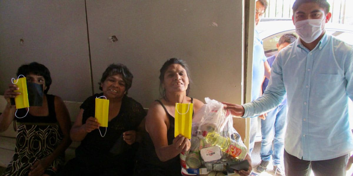 Distributing grocery packages to families in need in Reynosa Distributing grocery packages to families in need in Reynosa