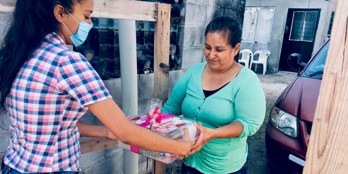 The church youth delivering special Mothers Day gifts to moms The church youth delivering special Mothers Day gifts to moms