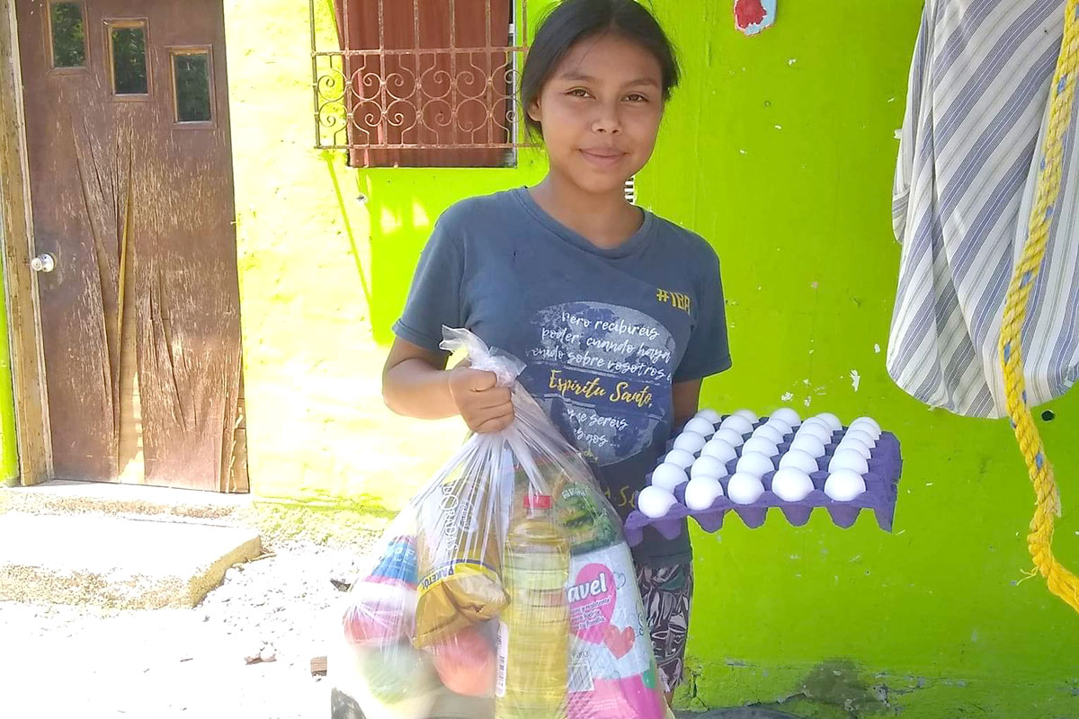 Delivering grocery packages to families in Miguel Aleman
