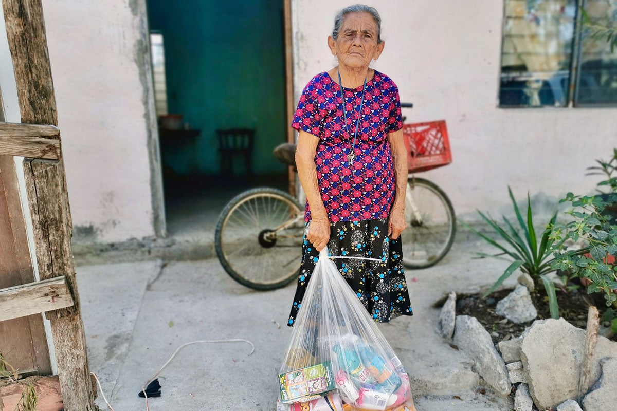 Distributing grocery packages to families in Reynosa Mexico