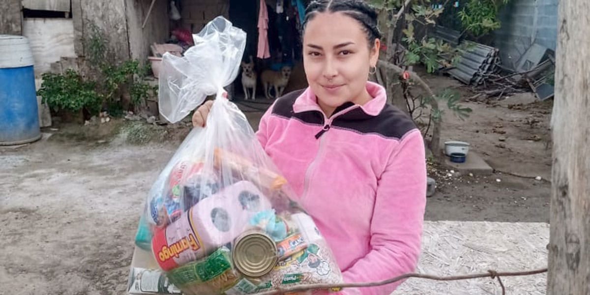 Distributing grocery packages to families in Reynosa Mexico