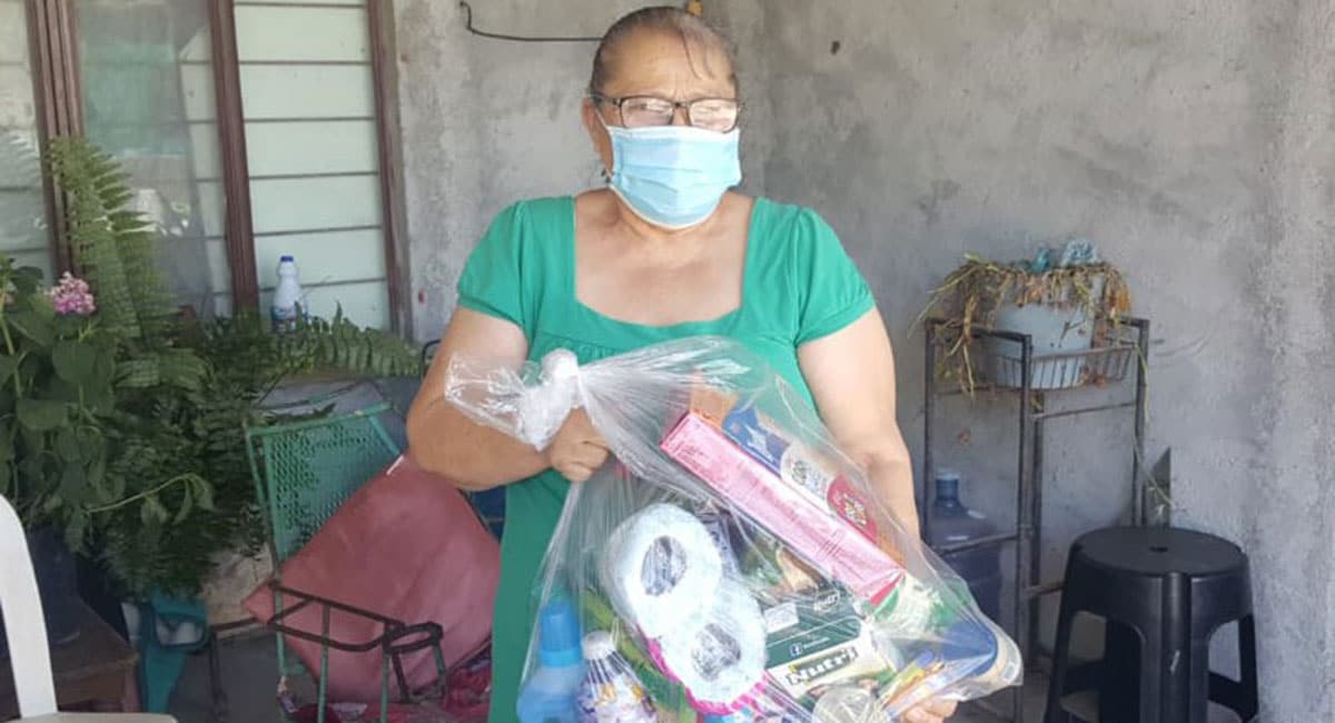 Distributing grocery packages for families in Miguel Aleman Mexico