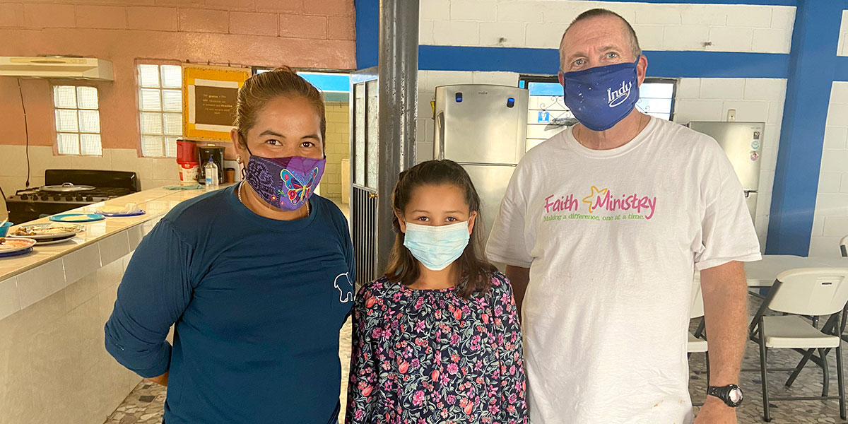 Our Board member Tom with his scholarship student and her mother in Reynosa Mexico
