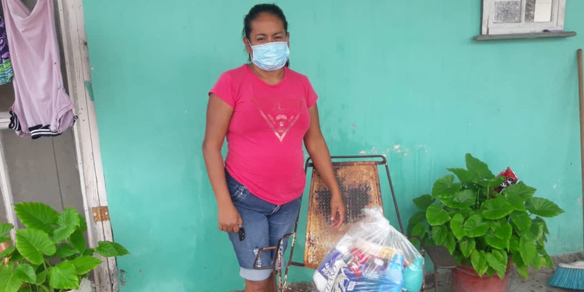 Distributing grocery packages for families in Miguel Aleman Mexico Distributing grocery packages for families in Miguel Aleman Mexico