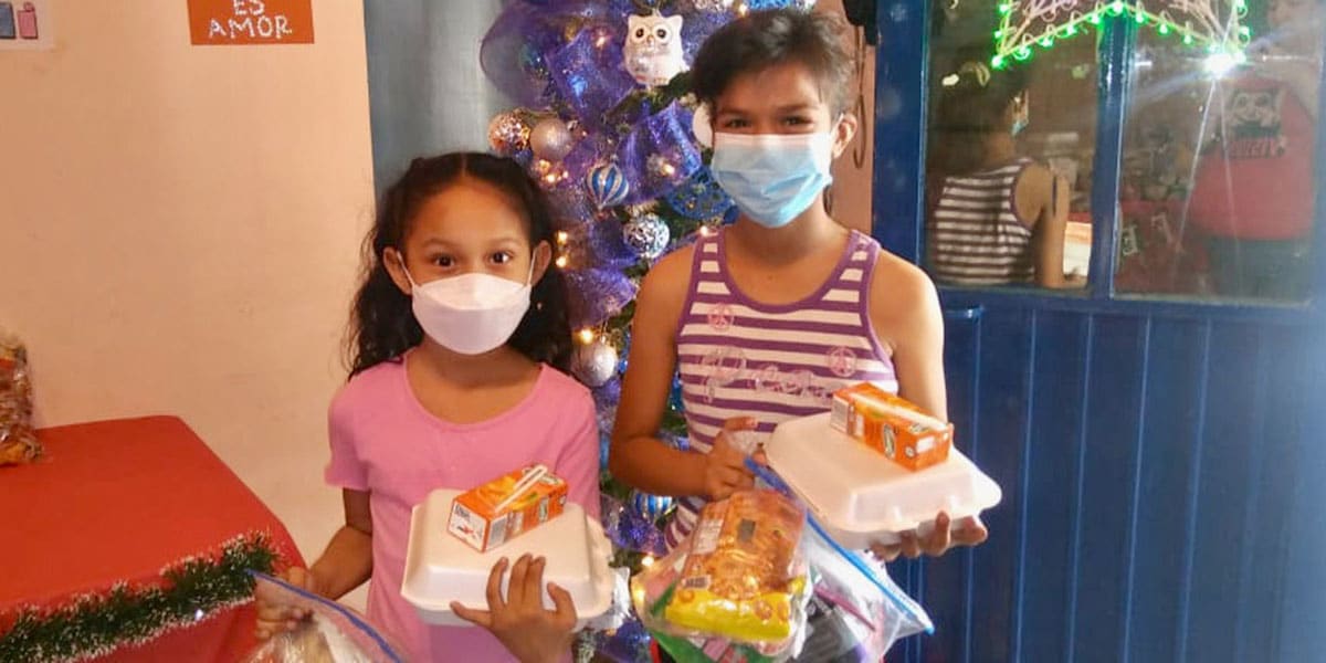 Kids with their toys and meals at the childrens nutrition Christmas fiesta in Miguel Aleman Kids with their toys and meals at the childrens nutrition Christmas fiesta in Miguel Aleman