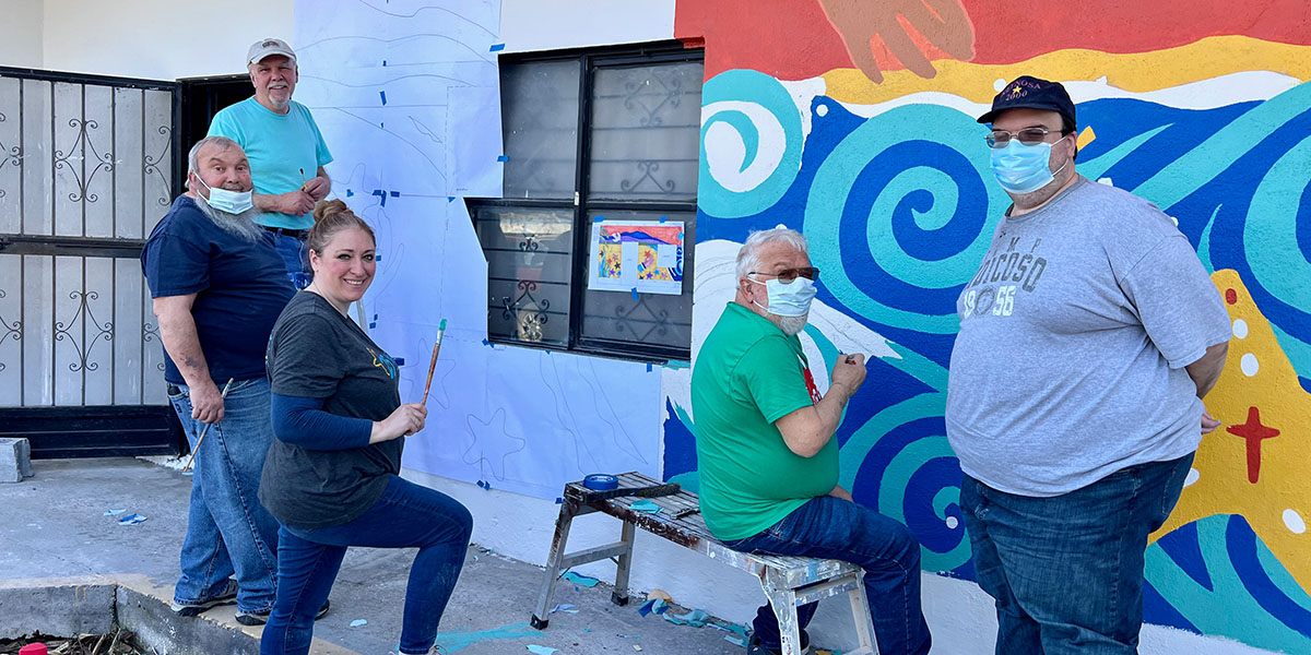 Friends from Indiana painting a new mural in Naranjito Mexico