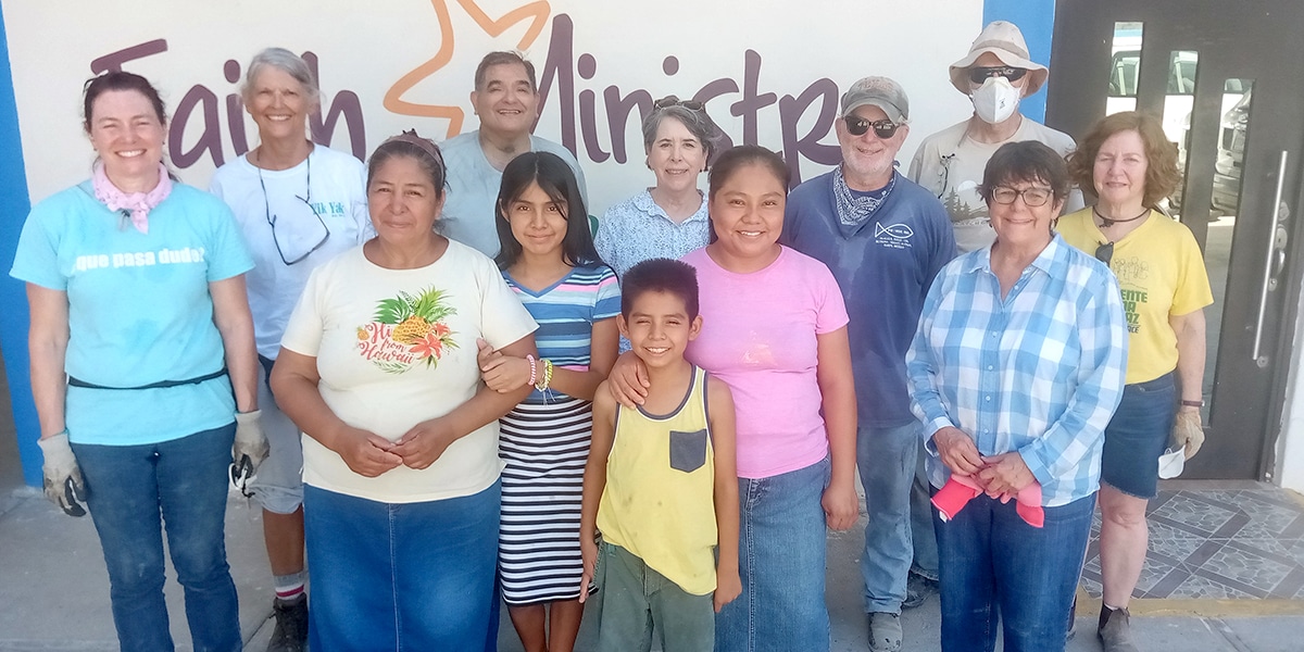 A group from Austin Texas with the family they helped build a house for in Reynosa Mexico