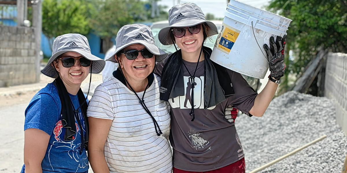 Family from Austin Texas working together to build a house for a family in Reynosa Mexico Family from Austin Texas working together to build a house for a family in Reynosa Mexico