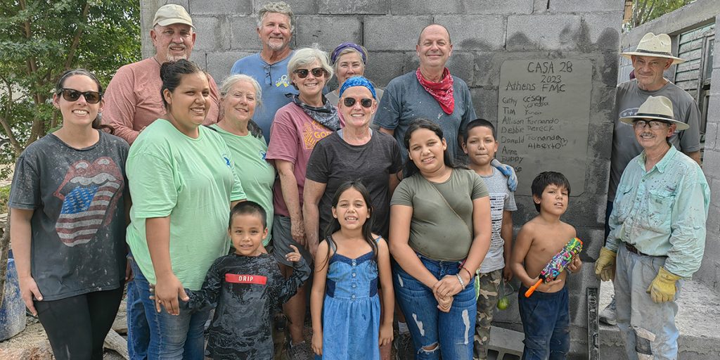 A team from Alabama with the family they helped build a house for in Reynosa Mexico
