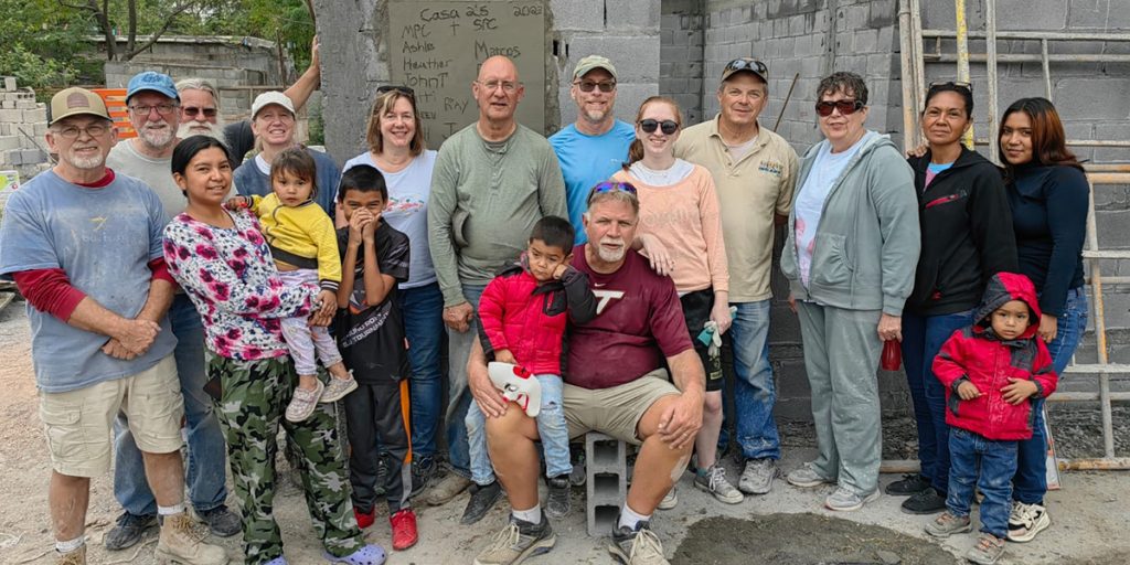 A team from Virginia and Indiana with the family they helped build a house for in Reynosa Mexico