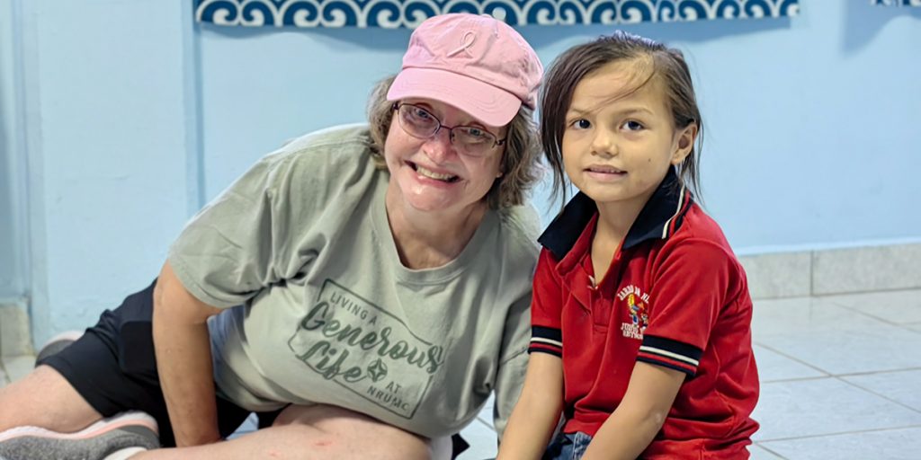 A friend from North Carolina with one of the kids from the childrens nutrition program in Reynosa Mexico