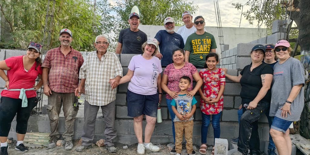Friends from North Carolina with one of the families they helped build a home for in Reynosa Mexico