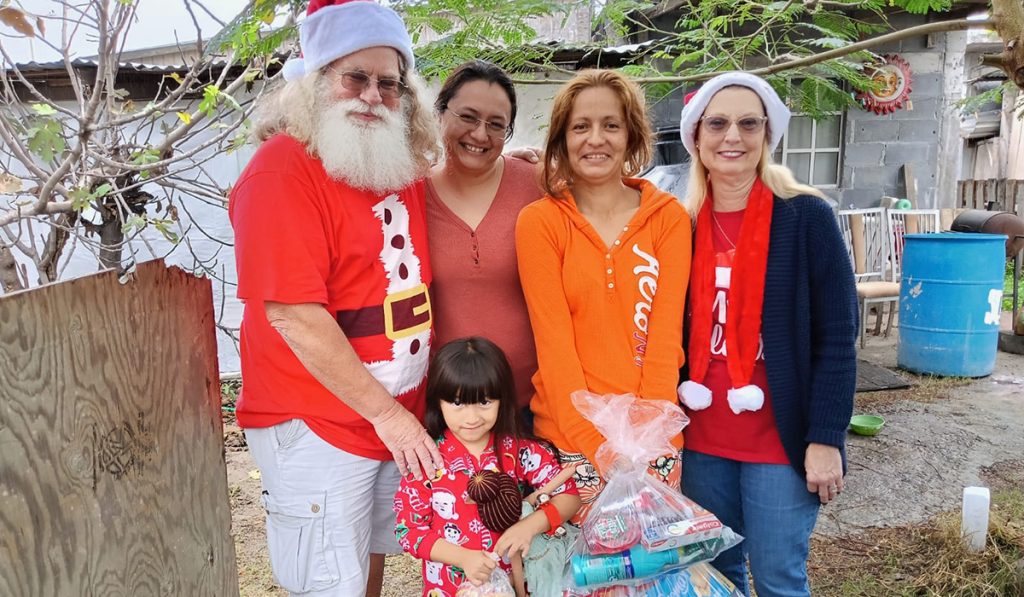 Delivering grocery packages and toys to families in the community in Mexico