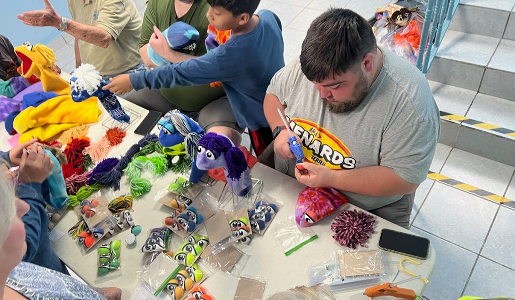 A group from Indianapolis making puppets with the kids at the childrens nutrition program in Reynosa Mexico