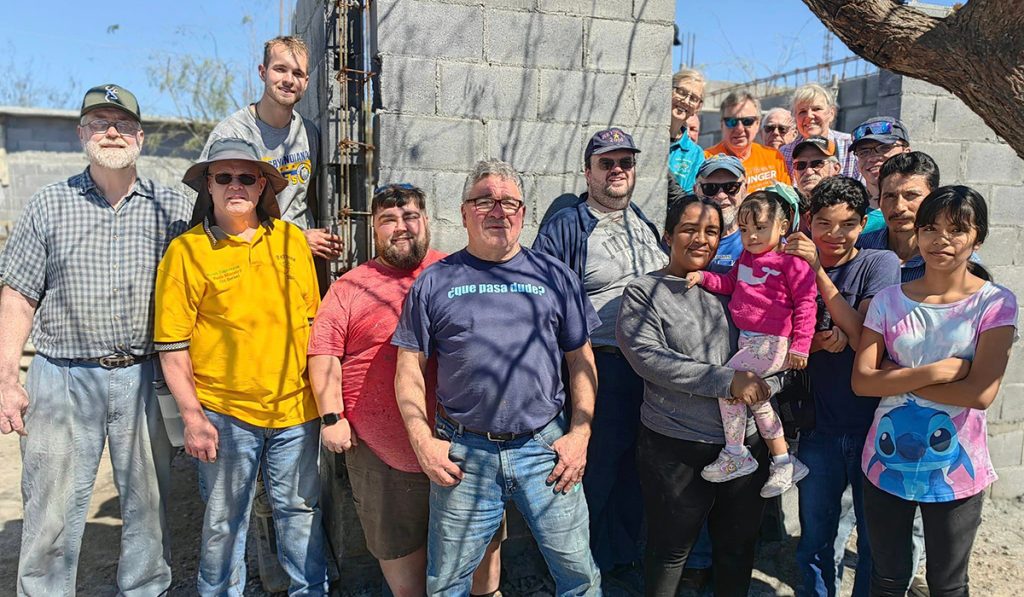 A group from Indianapolis with the family they helped build a house for in Reynosa Mexico