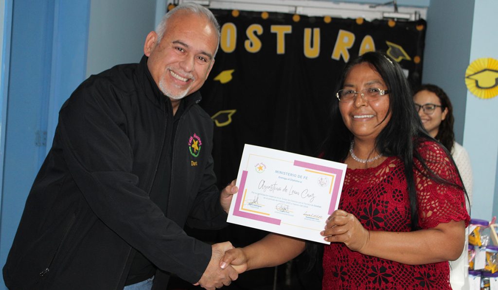 David giving one of our sewing program graduates her diploma in Reynosa Mexico