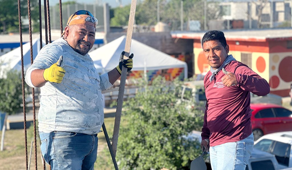 Balboa and Ismael supervising the roof pour of the Deantin community center in Mexico