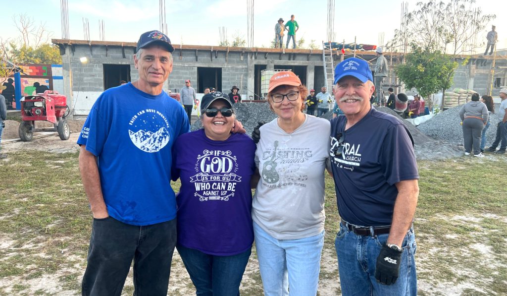 Visitors from Central Christian Church in Brownsville at the Deantin community center roof pour in Mexico