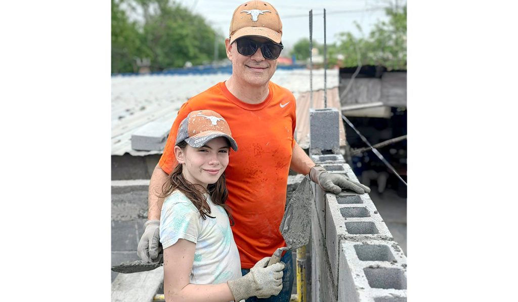 Family from Austin working together to build a house for a family in Reynosa Mexico