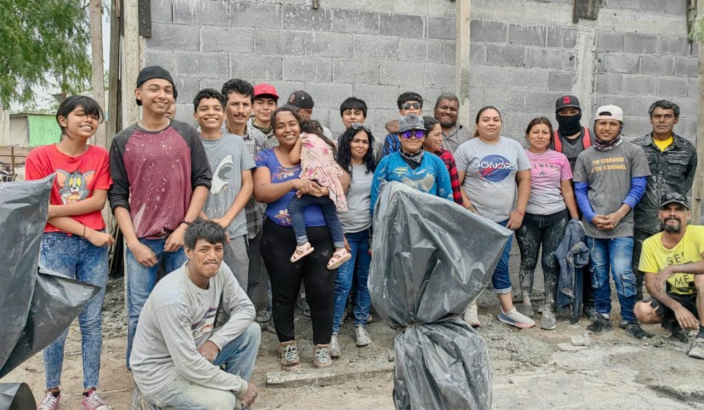 Our staff and volunteers pouring a roof on a house for a family in Reynosa Mexico Our staff and volunteers pouring a roof on a house for a family in Reynosa Mexico