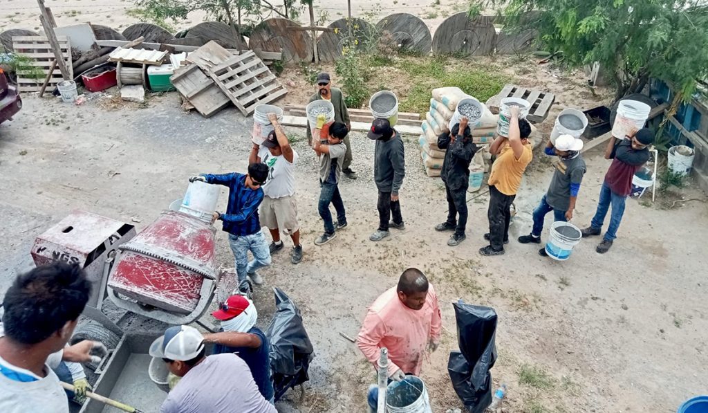 Our staff and volunteers pouring a roof on a house for a family in Reynosa Mexico Our staff and volunteers pouring a roof on a house for a family in Reynosa Mexico